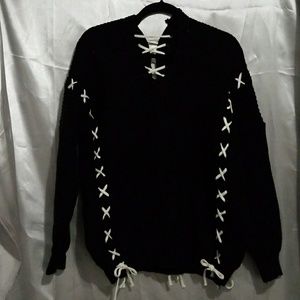 Knitted black and white Laced through sweater